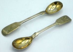 A pair of 1861 Victorian Newcastle silver mustard spoons by John Walton, monogrammed with crest, 120