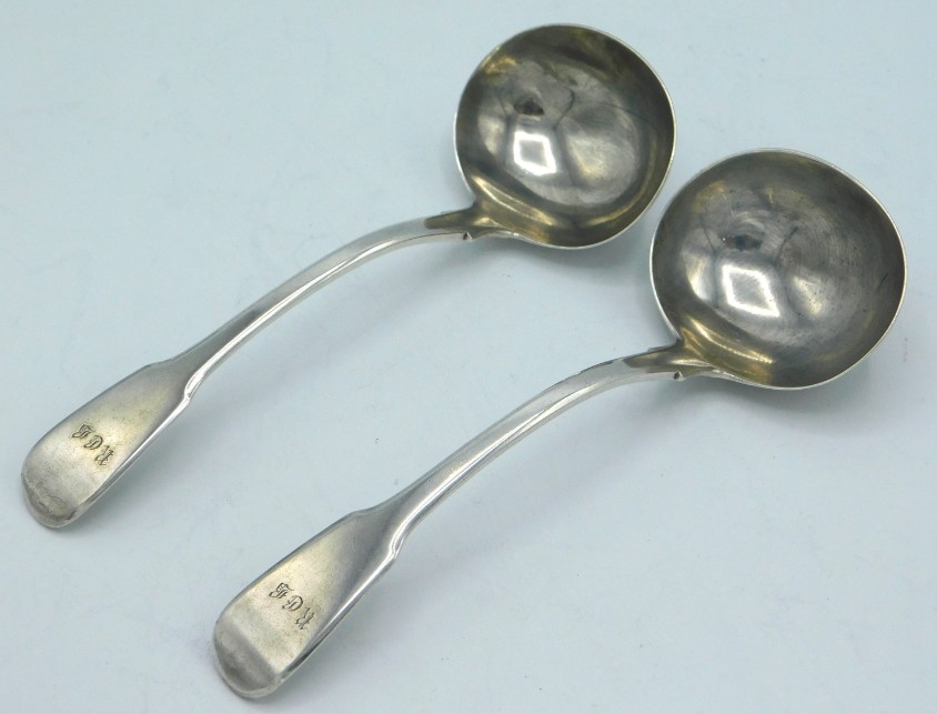 A pair of George III London silver sauce ladles by Thomas Wilkes Barker, monogrammed, 170mm long, ap