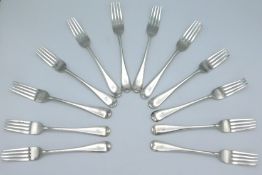 A matched set of twelve, eight 1903 Edwardian London silver dinner forks by Mappin Bros. one 1904 Ma