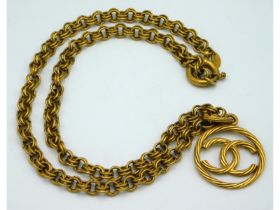 A 1993 Chanel 24ct gold plated chain with Coco Cha