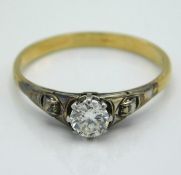 A yellow metal ring, tests electronically as 18ct gold, set of 0.33ct diamond, 2.4g, size Q/R