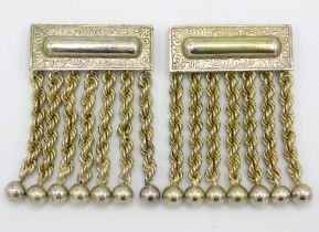 A pair of white metal masonic jewel apron tassels