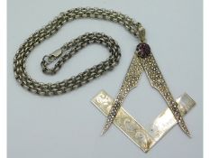A large, bespoke silver Masonic 'Grandmaster of Lodge' square & compass pendant set with ruby & whit