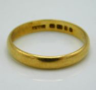 A 1960's 22ct gold band, 2.9g, size O/P