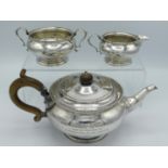 A 1923 Birmingham silver three piece tea set by William Noble with inscription 'Wedding Gift to Brot