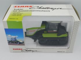 A boxed Norscot Models Claas Challenger tractor, s