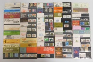 A quantity of fifty two stamp presentation packs