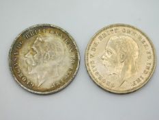 Two George V 1935 crowns, one of good quality grad
