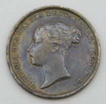 An 1842 Victoria silver bun head sixpence