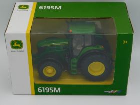 A boxed Britains John Deere 6195M, scale 1:32