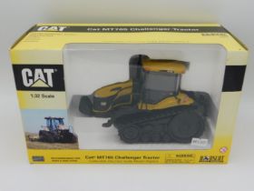 A boxed Norscot Models CAT MT765 Challenge tractor