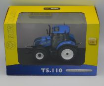 A boxed Universal Hobbies New Holland T5.110 tract