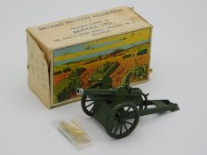 A boxed Britains Field Gun no.1292 with four missi