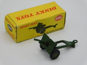 A boxed Dinky 689 25-pounder Field Gun