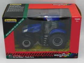 A boxed Britains New Holland T8.435 tractor, scale