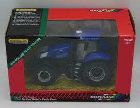 A boxed Britains new Holland T8.435 tractor, scale