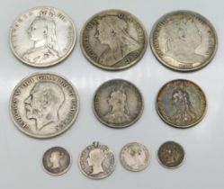 An 1890 Victoria silver half crown, a 1900 silver half crown, an 1817 George III silver crown, a 191