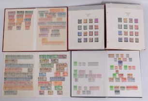 Four mint & used stamp albums containing Bermuda,