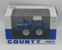 A boxed Ford County 1884 tractor, Ltd. Ed. 1000, s