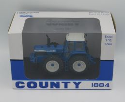 A boxed Ford County 1884 tractor, Ltd. Ed. 1000, s