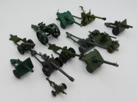 Twelve field guns including Dinky & Britains