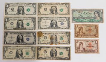 Seven vintage US one dollar bills, one two dollar