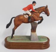 A Royal Worcester porcelain horse & rider group ti