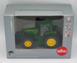 A boxed Siku Control 6751, John Deere tractor, sca