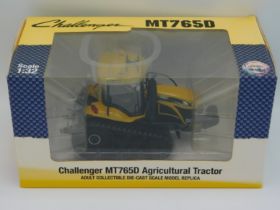 A boxed Usk Scalemodels Challenger MT7650 tractor,