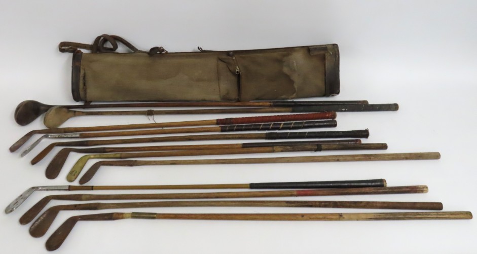 A selection of antique hickory golf clubs bag incl