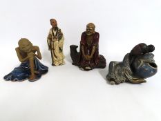 Four detailed Chinese & Tibetan stoneware figures,