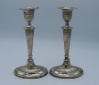 A 1915 pair of Birmingham silver candlesticks by W