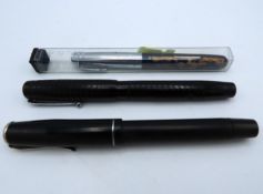 Three fountain pens including Swan Mabie Todd & Co