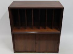 A 1960/70's Danish System Cado by designer Paul Cadovius, rosewood shelving & filing unit with cabin