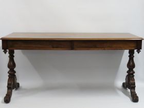 A 19thC. rosewood hall table with carved legs & tw