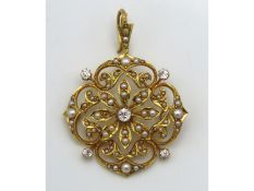 A 15ct gold antique ornate pendant set with diamond & pearl, 39mm wide x 29mm drop, lacking two pear