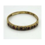 A 9ct gold half eternity ring set with ruby & whit