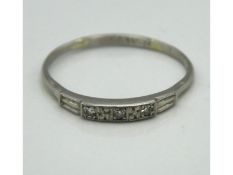 A platinum ring set with small diamonds, 2.3g, siz