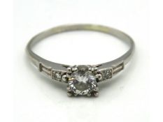 A platinum ring set with approx. 0.4ct of diamond,