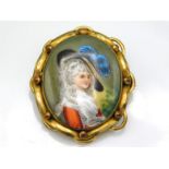 A gilt metal mounted porcelain cameo brooch, 45mm x 38mm, 11.7g