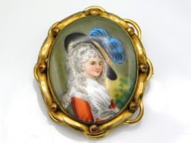 A gilt metal mounted porcelain cameo brooch, 45mm x 38mm, 11.7g