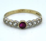 A 9ct gold ring set with ruby & white stones, 1.5g