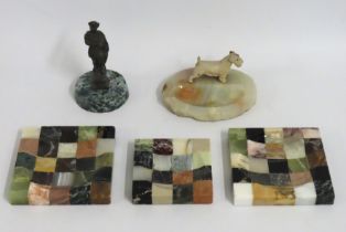 Three checkered stone pin dishes, an onyx ashtray