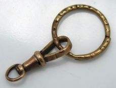 A yellow metal Albert clasp, tests as 9ct gold, we