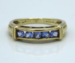 A 9ct gold ring set with five tanzanite stones, 2.