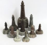 A collection of ten serpentine lighthouses, larges