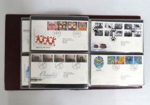 A Royal Mail album of first day covers, approx. 88