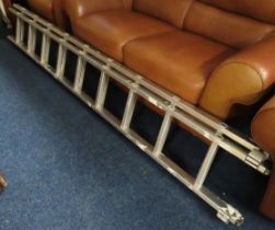 An aluminium ladder, 9ft long unextended, approx 1