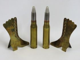 Two military shells twinned with a pair of trench