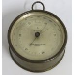 A brass cased Wilson, Worden & Co. barometer, 120m